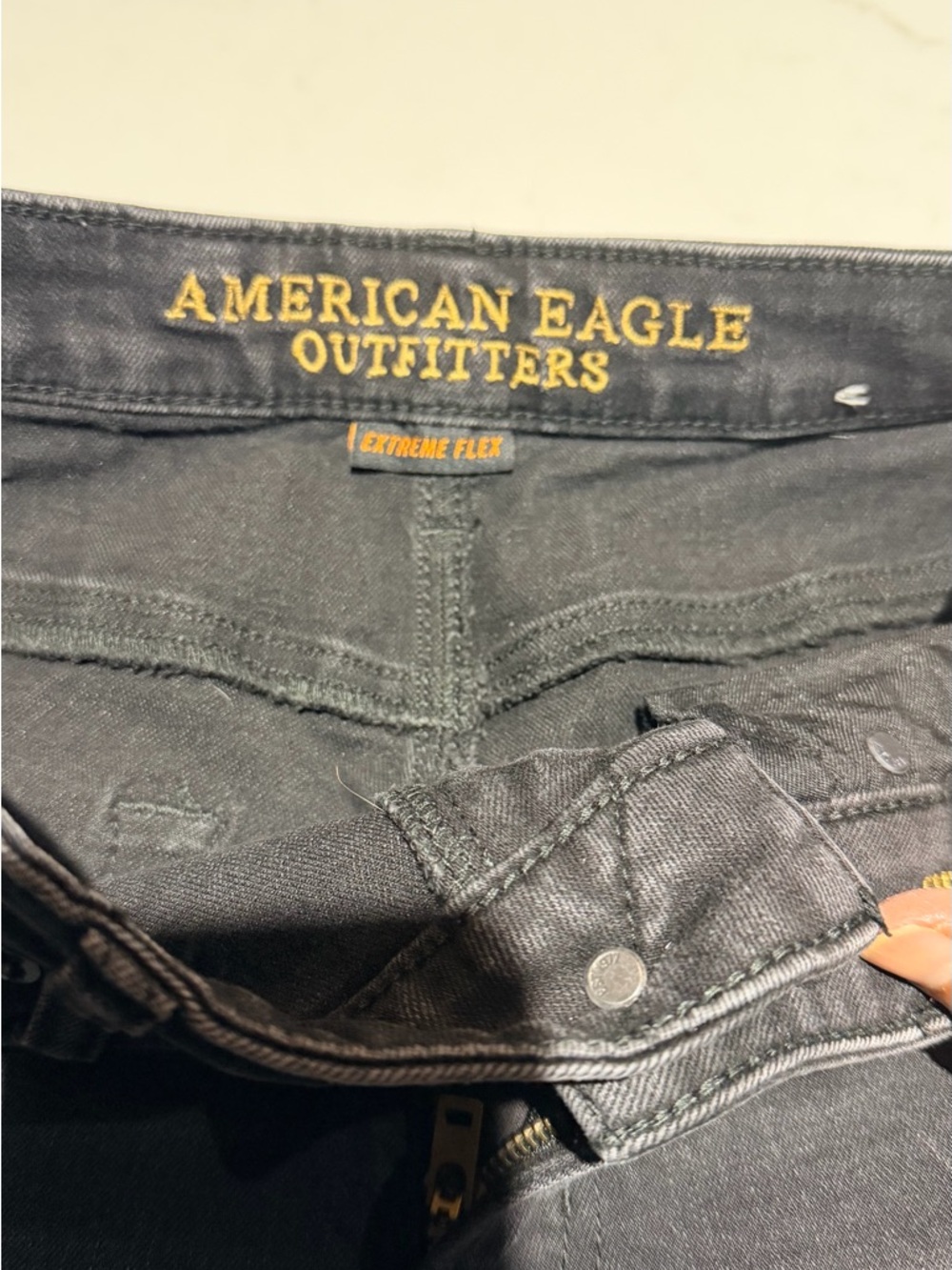 American Eagle Outfitters Slim Straight Jeans in Black with Yellow Stitching